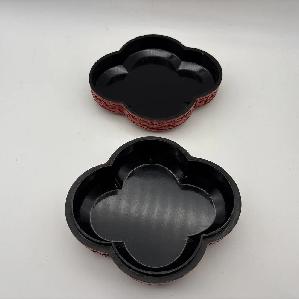 Red Cinnabar style detailed clover shaped decorative box black inside